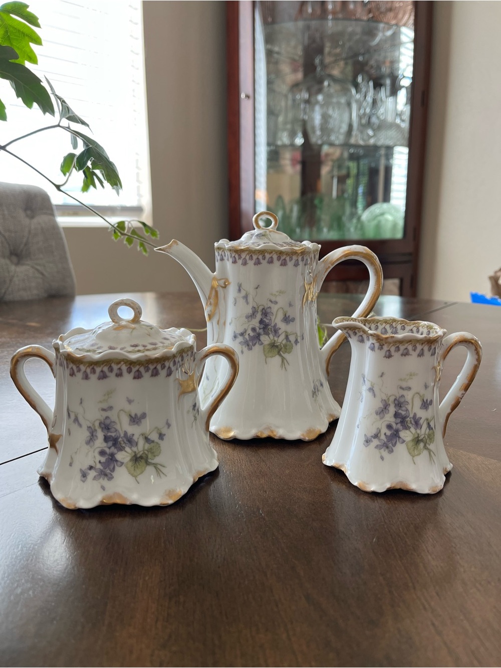 Haviland / Limoges France 
Porcelain Chocolate Set w/purple flowers.
Price Firm.